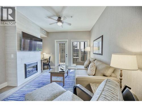 1200 Rancher Creek Road Unit# 225C, Osoyoos, BC - Indoor Photo Showing Living Room With Fireplace