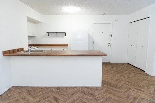 112-1975 Lee Ave, Victoria, BC - Indoor Photo Showing Kitchen With Double Sink
