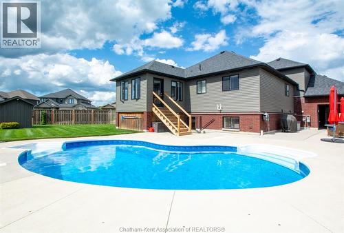 64 Valencia Drive, Chatham, ON - Outdoor With In Ground Pool With Deck Patio Veranda