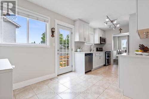 Kitchen with walkout to backyard - 104 Dyer Court, Cambridge, ON - Indoor Photo Showing Kitchen