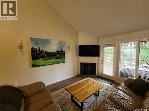 6 Eagle View Way, Elk Ridge, SK - Indoor Photo Showing Living Room With Fireplace