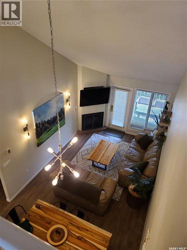6 Eagle View Way, Elk Ridge, SK - Indoor Photo Showing Living Room With Fireplace