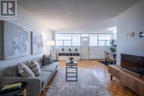 OPEN LIVING ROOM/ DINING - 1104 - 215 Glenridge Avenue, St. Catharines (Glendale/Glenridge), ON - Indoor Photo Showing Living Room