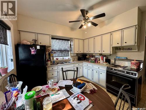 119 22Nd Street E, Prince Albert, SK - Indoor Photo Showing Kitchen With Double Sink