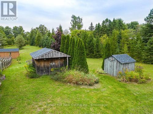4 storage sheds - 504097 Grey Road 12, West Grey, ON - Outdoor With Backyard