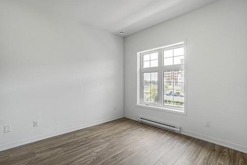 Bedroom - 202-9175 Rue Lennon, Brossard, QC - Indoor Photo Showing Other Room