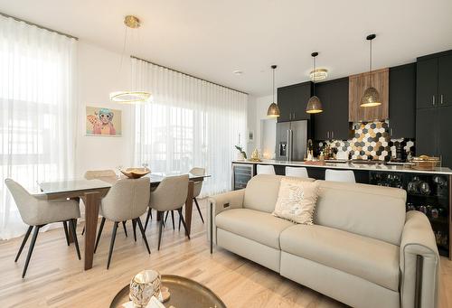 Vue d'ensemble - 313-65 Rue Des Tilleuls, Candiac, QC - Indoor Photo Showing Other Room