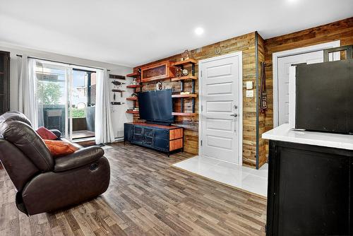 Living room - 102-147 Rue Principale, Saint-Basile-Le-Grand, QC - Indoor Photo Showing Living Room With Fireplace