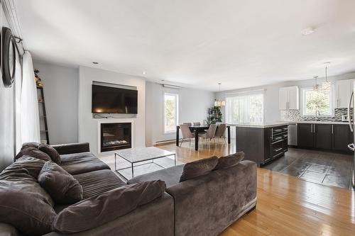 Autre - 851 Rue Papineau, Laval (Saint-Vincent-De-Paul), QC - Indoor Photo Showing Living Room With Fireplace