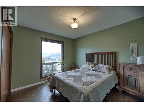 2nd Bedroom on main floor - 7460 Valley Heights Drive, Grand Forks, BC - Indoor Photo Showing Bedroom