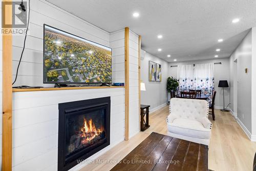 517 Wales Drive, Saugeen Shores, ON - Indoor Photo Showing Living Room With Fireplace