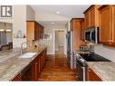 2455 Quail Ridge Boulevard Unit# 111, Kelowna, BC  - Indoor Photo Showing Kitchen With Double Sink 
