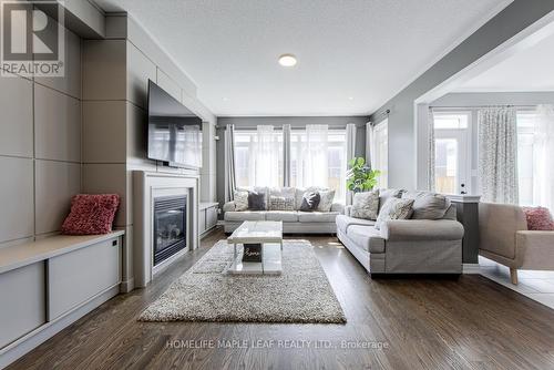 118 Lorne Thomas Place, New Tecumseth, ON - Indoor Photo Showing Living Room With Fireplace