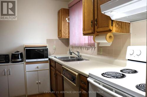 400 King Street W, Gananoque, ON - Indoor Photo Showing Kitchen With Double Sink