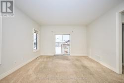 Living room with sliders to back deck - 