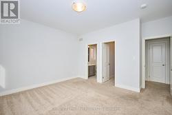 Primary bedroom w/ensuite bathroom & W/I closet - 