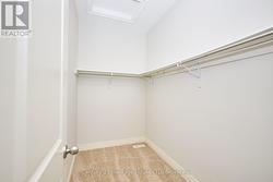 Large walk-in closet in primary bedroom - 