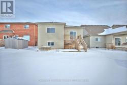 Rear elevation - deck off living room - 