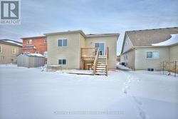 Large back yard and view of deck - 