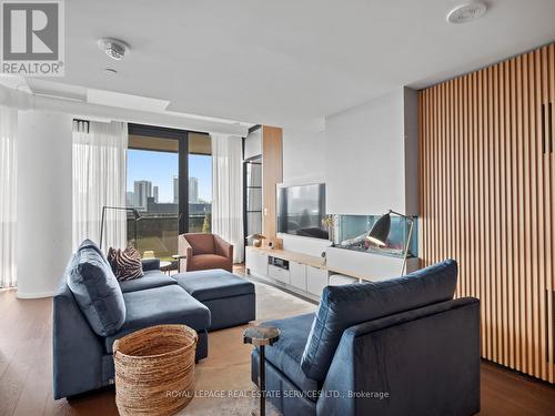 904 - 21 Lawren Harris Square, Toronto, ON - Indoor Photo Showing Living Room