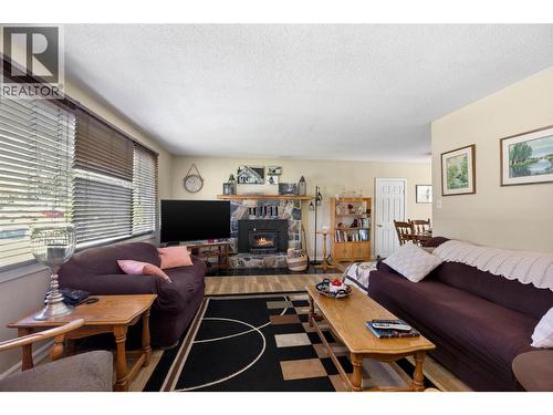 229 Lakeshore Drive, Chase, BC - Indoor Photo Showing Living Room With Fireplace