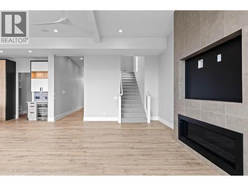 1240 Ponds Avenue, Kelowna, BC - Indoor With Fireplace