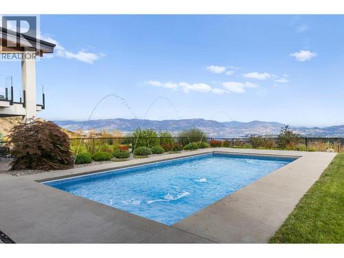 1240 Ponds Avenue, Kelowna, BC - Outdoor With In Ground Pool With View