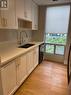 610 - 85 Bloor Street E, Toronto, ON  - Indoor Photo Showing Kitchen With Double Sink 