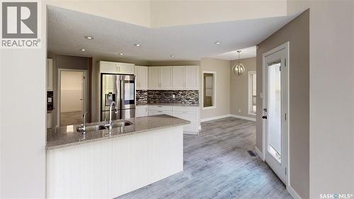 5006 Wascana Vista Court, Regina, SK - Indoor Photo Showing Kitchen With Double Sink