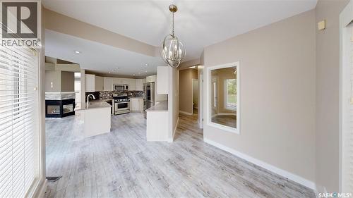 5006 Wascana Vista Court, Regina, SK - Indoor Photo Showing Other Room With Fireplace