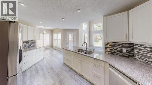 5006 Wascana Vista Court, Regina, SK - Indoor Photo Showing Kitchen With Double Sink With Upgraded Kitchen