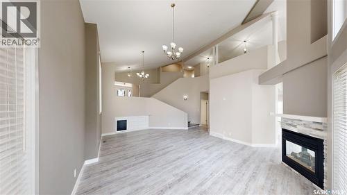 5006 Wascana Vista Court, Regina, SK - Indoor With Fireplace