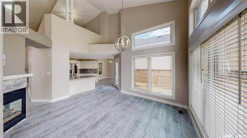 5006 Wascana Vista Court, Regina, SK - Indoor With Fireplace