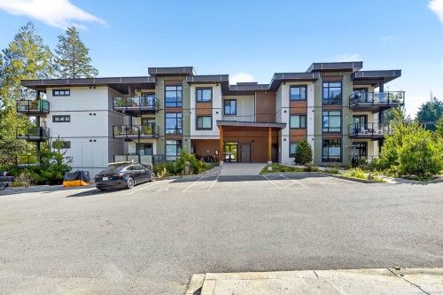302-700 Yew Wood Rd, Tofino, BC - Outdoor With Balcony With Facade
