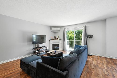 Living room - 6-18 Imp. Berthe Morisot, Gatineau (Gatineau), QC - Indoor Photo Showing Living Room With Fireplace
