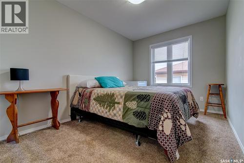 207 South Front Street, Pense, SK - Indoor Photo Showing Bedroom