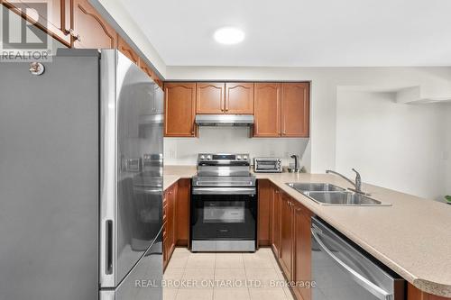 27 - 649E Warden Avenue, Toronto, ON - Indoor Photo Showing Kitchen With Double Sink