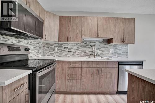 213 410 Ledingham Way, Saskatoon, SK - Indoor Photo Showing Kitchen With Upgraded Kitchen