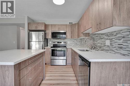 213 410 Ledingham Way, Saskatoon, SK - Indoor Photo Showing Kitchen With Upgraded Kitchen