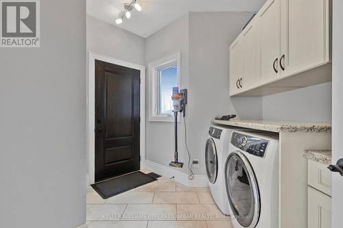 25 Heron Boulevard, Springwater, ON - Indoor Photo Showing Laundry Room