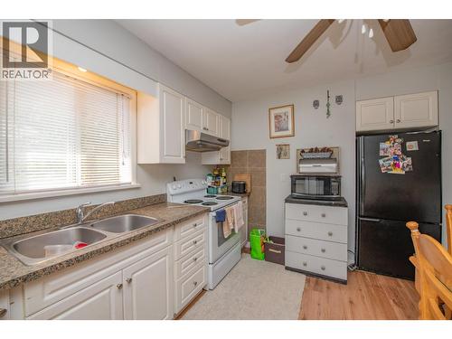 3908 Pleasant Valley Road, Vernon, BC - Indoor Photo Showing Kitchen With Double Sink