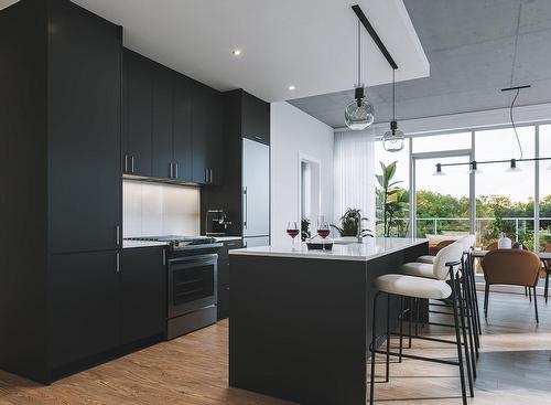 Cuisine - 701-515 Rue Des Marronniers, Candiac, QC - Indoor Photo Showing Kitchen With Upgraded Kitchen