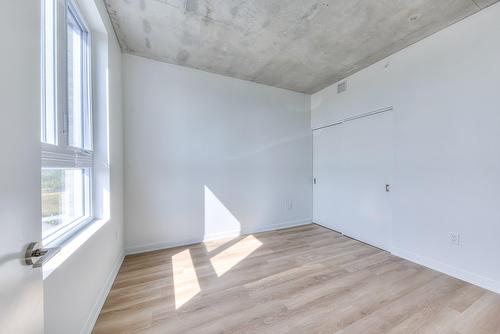 Chambre à coucher - 712-515 Rue Des Marronniers, Candiac, QC - Indoor Photo Showing Other Room