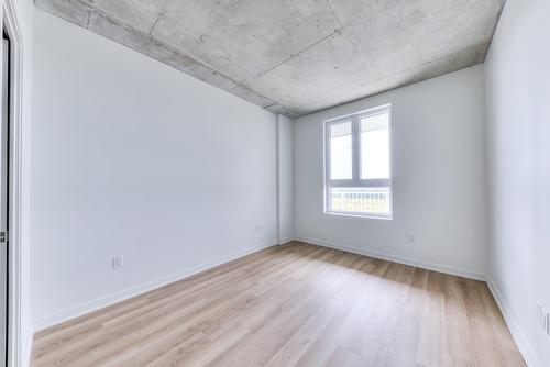 Chambre à coucher - 712-515 Rue Des Marronniers, Candiac, QC - Indoor Photo Showing Other Room