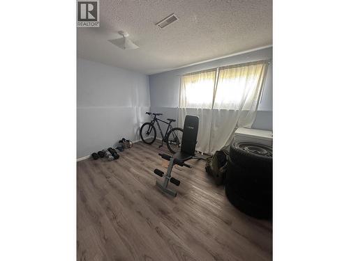 5303 41 Street, Fort Nelson, BC - Indoor Photo Showing Gym Room