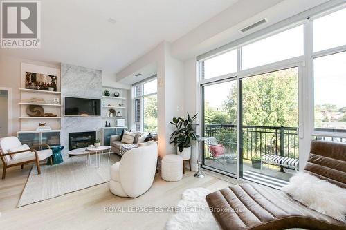 408 - 66 Kippendavie Avenue, Toronto, ON - Indoor Photo Showing Living Room With Fireplace