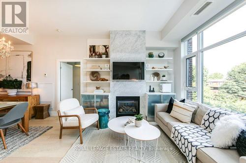 408 - 66 Kippendavie Avenue, Toronto, ON - Indoor Photo Showing Living Room With Fireplace