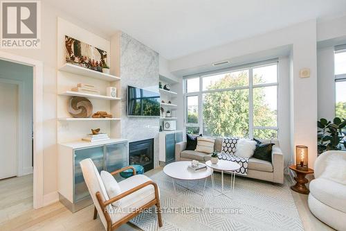 408 - 66 Kippendavie Avenue, Toronto, ON - Indoor Photo Showing Living Room With Fireplace