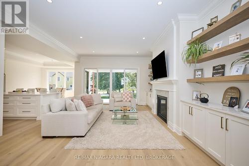 21 Ivy Crescent, Thorold (Confederation Heights), ON - Indoor Photo Showing Living Room With Fireplace