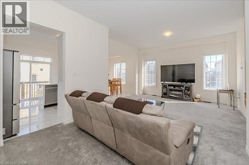 Living room featuring carpet flooring - 35 Hitchman Street, Paris, ON - Indoor Photo Showing Living Room
